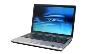 Sony VAIO VGN-S4M/S laptop with display screen showing VAIO logo on a white background.