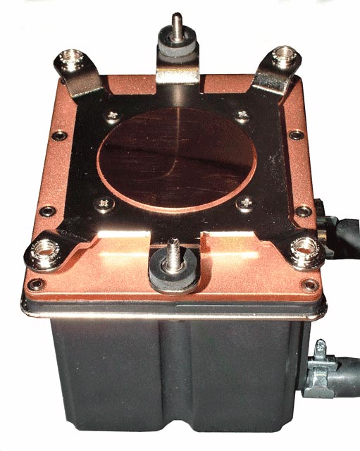 Close-up of the Cooler Master Aquagate Mini R120 water block with a copper base and mounting brackets, against a black background.