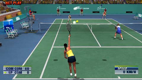 Screenshot of 'Virtua Tennis: World Tour' video game showing a tennis match in progress on a hard court with a score display indicating a point in a match, player avatars in mid-action, and a stadium full of spectators in the background.