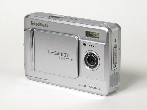 Goodmans G-Shot 3027TFT Budget Digital Camera, a 3-megapixel camera with a silver body, displayed against a white background.