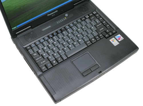 Panasonic ToughBook CF-51 semi-rugged notebook open on a desk showing its keyboard, touchpad, and screen with visible Panasonic logo.