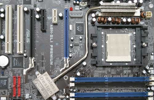 Close-up of Asus A8N-SLI Premium Socket 939 motherboard highlighting the CPU socket, RAM slots, and various connectors.