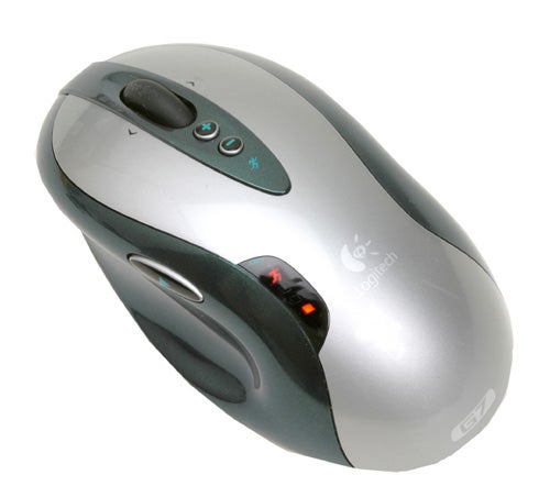 Logitech G7 cordless 2000dpi laser mouse with silver and black design, featuring side buttons and battery indicator lights.