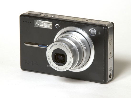 Kodak Easyshare V550 digital camera with lens extended on a white background.