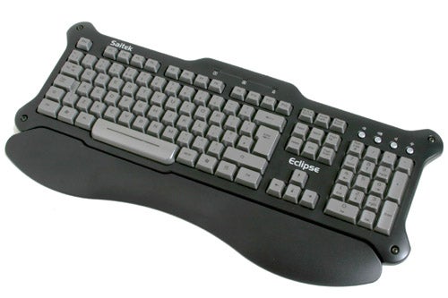 A Saitek Eclipse Keyboard with backlight keys, featuring a wrist rest, on a white background.