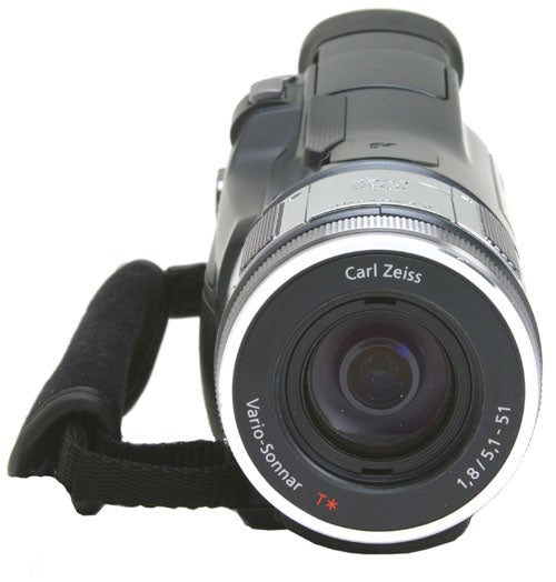 Sony HDR-HC1E High Definition Camcorder with Carl Zeiss lens and black hand strap on a white background.
