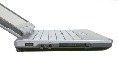 Side view of a Fujitsu-Siemens Lifebook P1510 showing open lid, keyboard, and ports including USB and audio jacks.