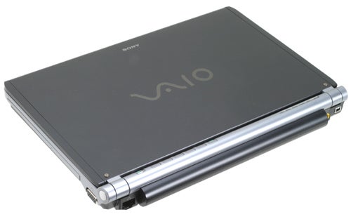 Sony VAIO VGN-TX1XP laptop closed, showing the black lid with VAIO logo, silver hinges visible.