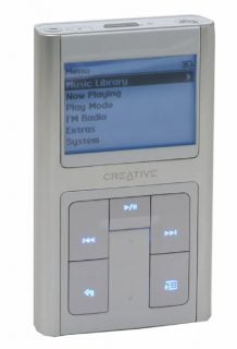 Creative Zen Sleek MP3 player with screen displaying the main menu including options such as Music Library, Now Playing, Play Mode, FM Radio, Extras, and System.