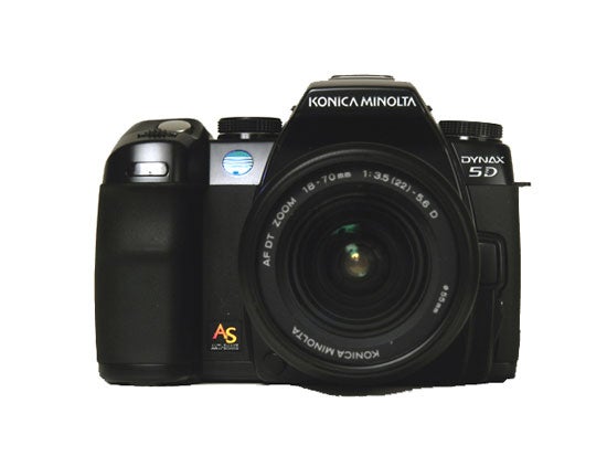 Konica Minolta Dynax 5D digital SLR camera with attached lens displayed against a neutral background.