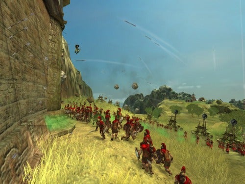 Screenshot of gameplay from Black & White 2 showing soldiers and catapults.