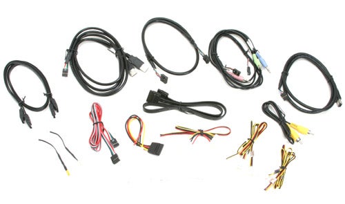 Assortment of cables and connectors for Akasa AllInOne AK-ALL-01BK multifunction panel, displayed on a light background.