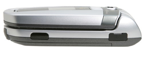 Side view of a closed NEC N411i i-mode mobile phone showing its slim profile and external buttons.