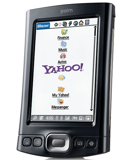 Palm T|X handheld PDA displaying Yahoo! homepage on its screen with application icons visible at the top and navigation buttons at the bottom.