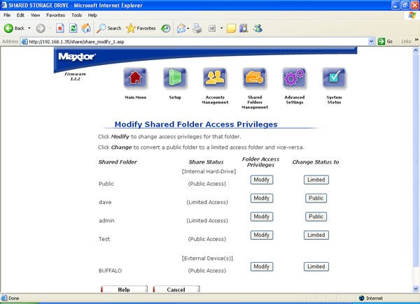 Screenshot of Maxtor Shared Storage Drive web interface showing the Modify Shared Folder Access Privileges page on Internet Explorer, with options to modify folder access and share status for different users.