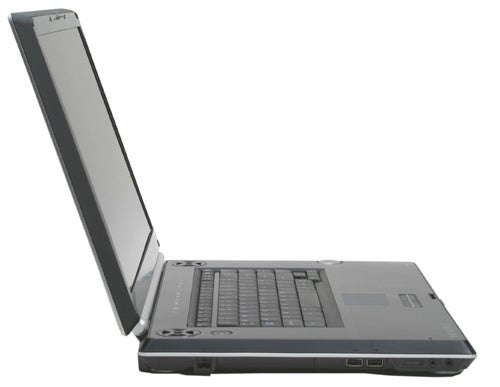Toshiba Qosmio G20 laptop with screen lifted, showing the keyboard and touchpad. The laptop is silver with black keys and appears to be on a plain background.