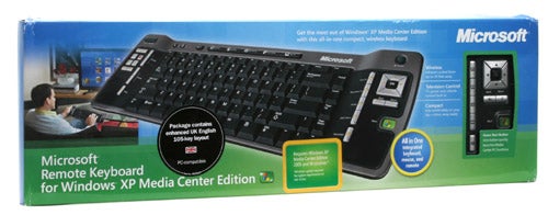 Microsoft Remote Keyboard for Windows XP Media Center Edition packaging, highlighting the keyboard features with an inset image of a user utilizing the keyboard in a living room setting.