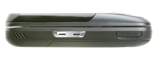 Side view of a closed Samsung SGH-D600 mobile phone showing its sliding design and external ports.