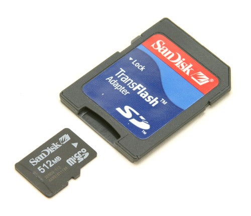 SanDisk microSD card with an adapter, labelled with a capacity of 512MB, typically used for expandable storage in devices such as the Samsung SGH-D600 mobile phone.