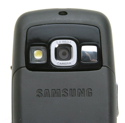 Samsung SGH-D600 phone showing the integrated 2.0-megapixel camera and LED flash on the back panel.