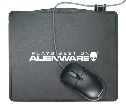 Alienware mouse and mousepad with company logo.
