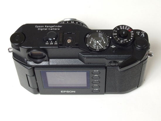 Epson R-D1 digital rangefinder camera on a white background showing top view with dials and LCD screen.