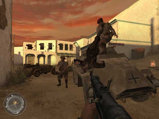 Screenshot from Call of Duty 2 video game showing first-person perspective with a soldier aiming a rifle. In the background, there are soldiers on and around a military tank under a sunset sky.