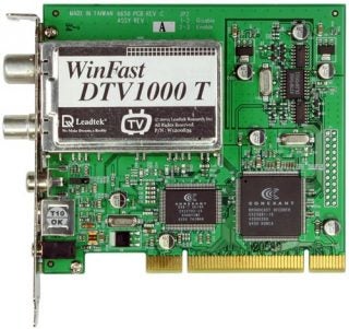 Leadtek WinFast DTV1000 T digital TV tuner card with visible circuits, chips, and coaxial input.