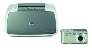 HP Photosmart 422 Portable Photo Studio with a silver and light gray printer and a matching 5.2-megapixel digital camera.