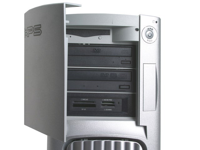 Close-up of the Dell XPS 600 tower with the front panel open, revealing multiple DVD and CD drives and the XPS logo.
