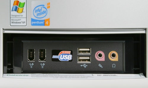Gateway desktop PC with Intel and USB stickers, front ports visible.