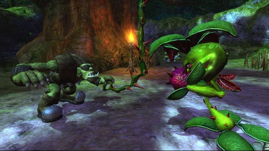 Screenshot of gameplay from Kameo: Elements of Power, showing a character transformed into a creature resembling a large green plant in combat with stone-like enemies in a forest environment.