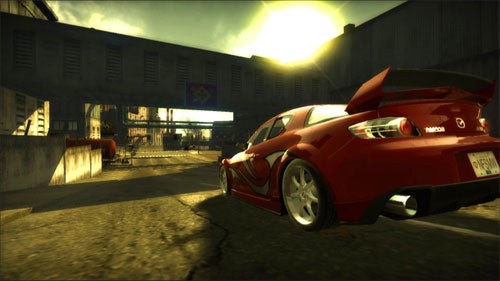 Screenshot of a red Mazda RX-8 from the video game Need for Speed: Most Wanted (2005) with the in-game license plate reading 