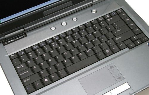 Close-up of an Alienware Area-51 m5500 laptop keyboard and touchpad with the Alienware logo above the keyboard.
