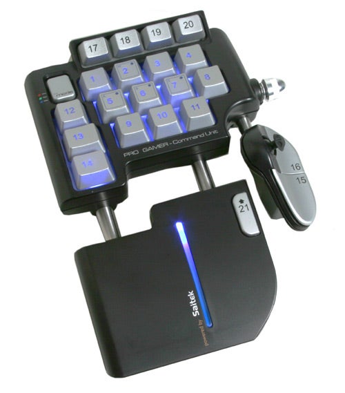 Saitek Pro Gamer Command Unit with a backlit keyboard and ergonomic design, featuring numbered keys, a joystick, and a blue LED indicator.