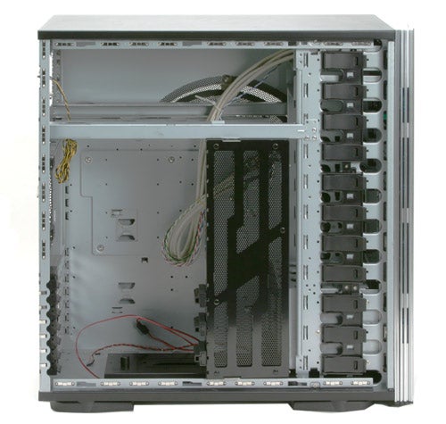 Interior view of an A+ XBlade Full Tower Case showing the empty chassis with drive bays, cable management, and cooling fan mounts.