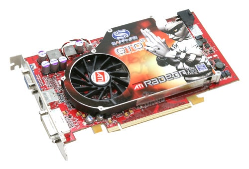 Sapphire Radeon X800GTO2 graphics card with red PCB, central cooling fan, and distinctive branding on the cover, including the logo and a robotic character illustration.