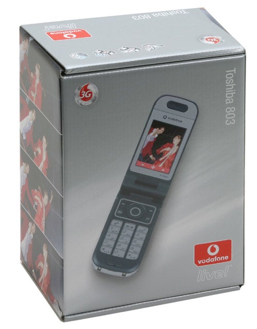 Packaging box for Toshiba TS803 mobile phone, featuring the phone image on the front with Vodafone branding, and 3G connectivity logo.