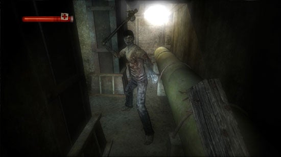 Screenshot from the video game Condemned: Criminal Origins showing a first-person view of the protagonist holding a pipe as a weapon and encountering an aggressor in a dimly lit corridor.
