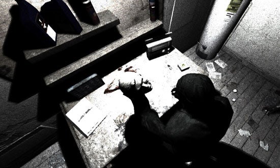 Screenshot from the video game Condemned: Criminal Origins depicting a first-person view where the player's character is examining a crime scene with a dead body on the floor, set in a dimly lit, gritty environment.