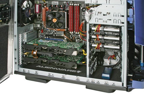 Interior view of an open Alienware Aurora 7500 gaming PC showing the motherboard, graphics cards, and internal components.