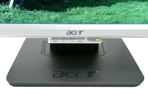 Close-up view of the Acer AL2416WS 24-inch LCD monitor's base and lower bezel showing control buttons and logo.