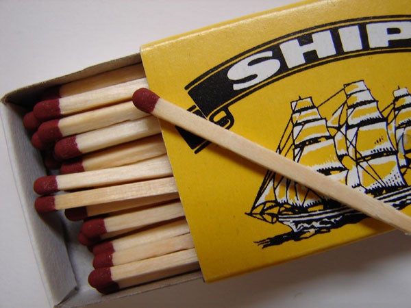 Box of matches with one matchstick removed.
