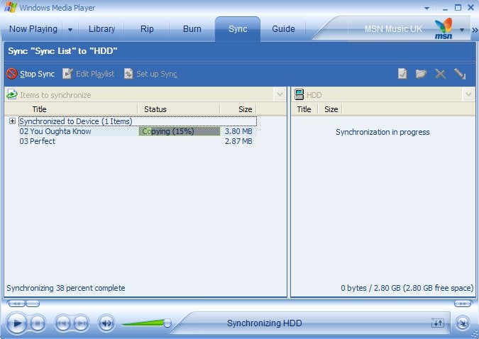 Screenshot of Windows Media Player syncing music to a Samsung i300 smartphone with the synchronization process indicating 38 percent completion and showing the transfer of specific audio files.