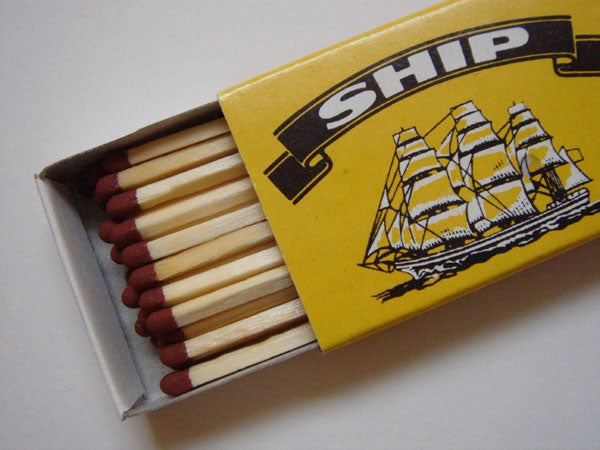 Box of matches with ship illustration on the cover.