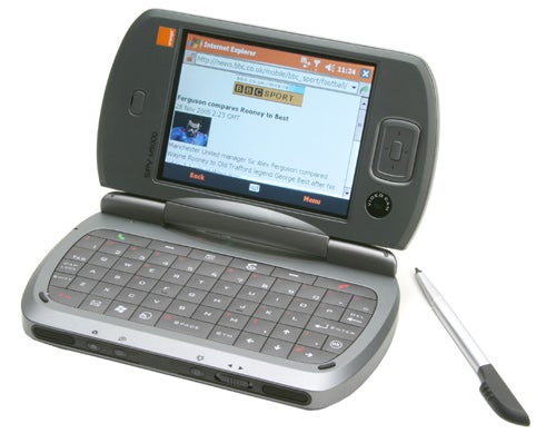 Orange SPV M5000 3G smartphone displayed open with a QWERTY keyboard, screen showing a web browser, and stylus pen on the right side.