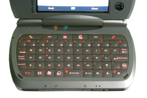 Orange SPV M5000 smartphone with QWERTY keyboard exposed and display screen visible.