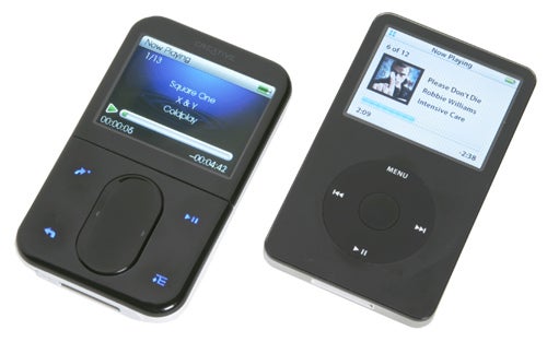 Creative Zen Vision: M multimedia player next to an Apple iPod, displaying their screens with music tracks information.