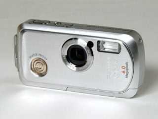 Pentax Optio WPi waterproof camera with a silver body, lens on the right side, and visible waterproof seal around the edge, placed against a white background.