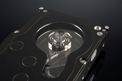 Close-up of a Western Digital WD1500ADFD Raptor Hard Disk showing the spindle and platters with a reflective black surface.